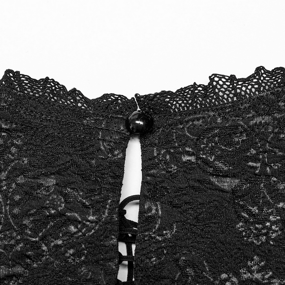 Close-up of Gothic lace drawstring top's neck with intricate lace detailing and button accent.