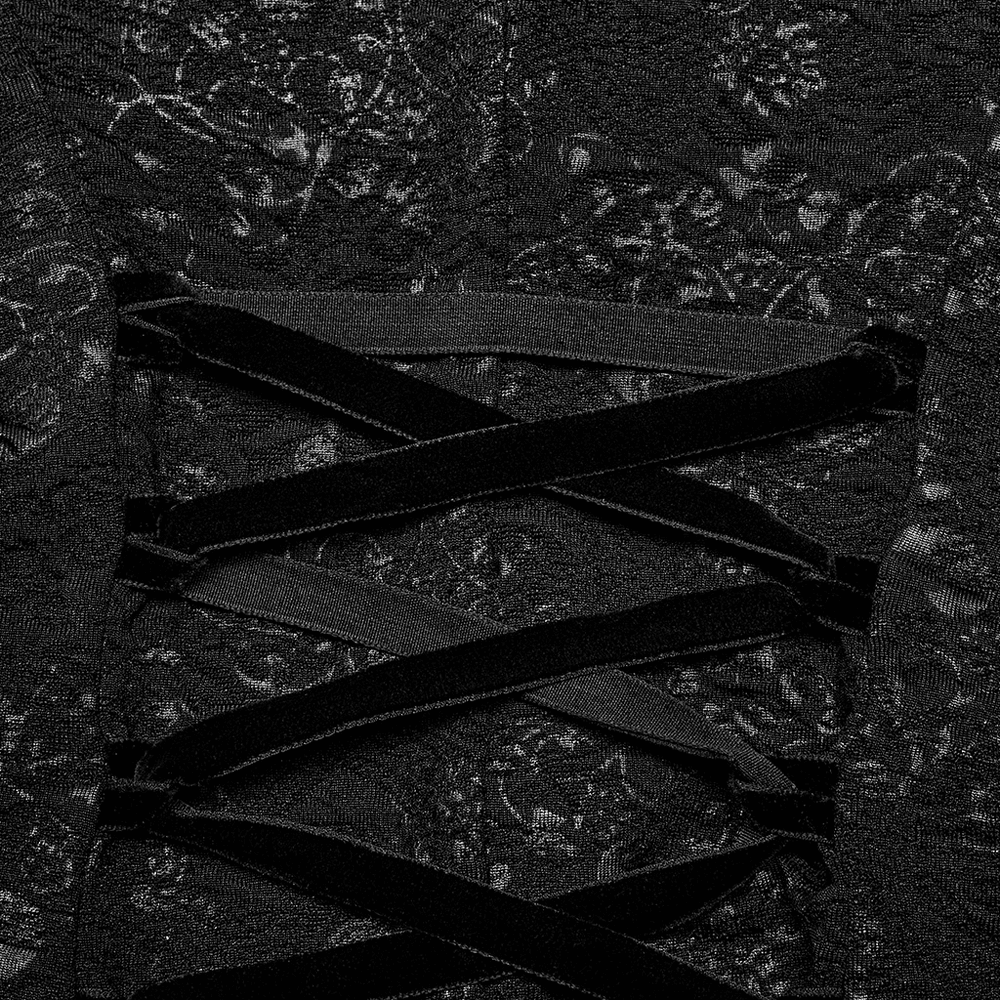 Close-up of black jacquard lace with seductive drawstring cutout design for Gothic fashion lovers.