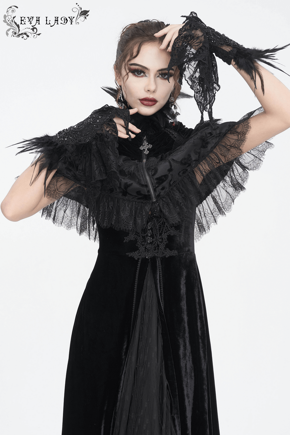 Gothic women in black lace fingerless gloves with feathers, exuding elegance and drama for costume or night out.