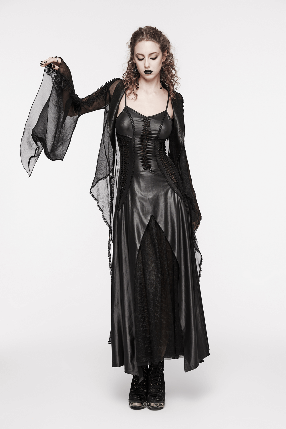 Gothic women's lace-up black dress showcasing burnt flower pattern and dramatic lace-up back for a captivating look.