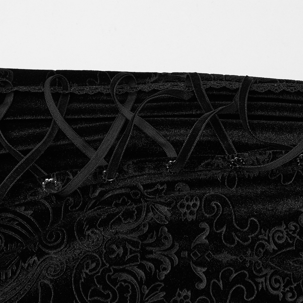 Close-up of Gothic women's lace-up embossed velvet fishtail skirt showing intricate lace and plum blossom eyelets.