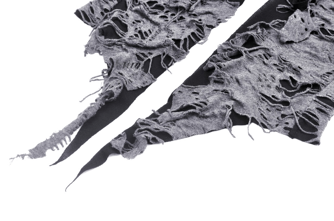 Close-up of edgy lace-up shredded fabric with grey distressed detailing, perfect for gothic style tops and fashion.