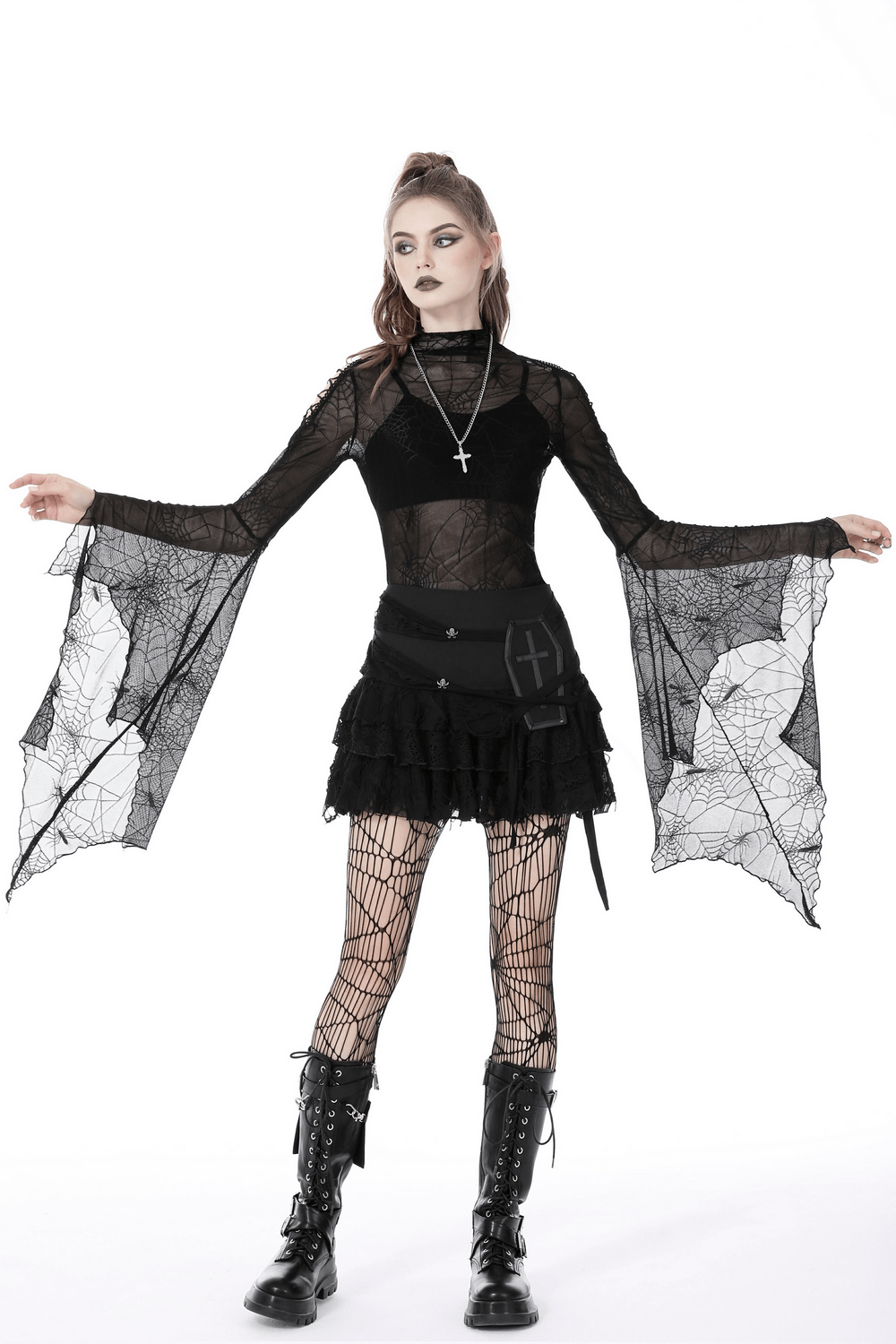 Gothic women's long sleeve mesh top with spiderweb design, styled with edgy accessories and a chic skirt.