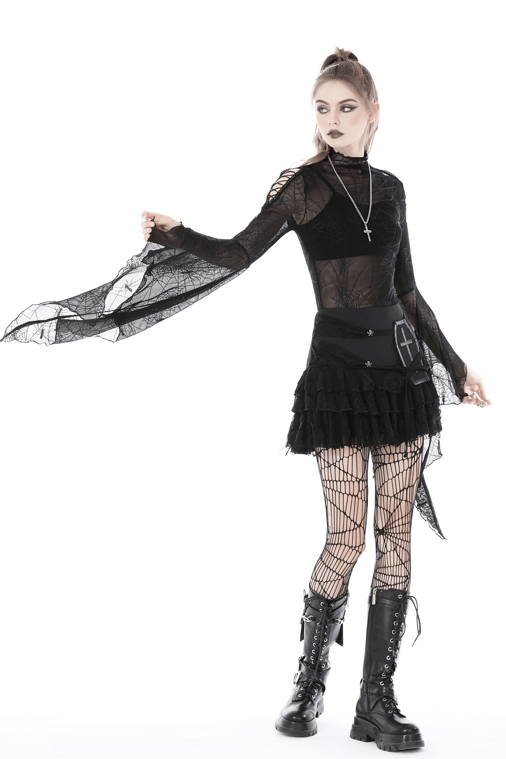 Gothic women's black mesh spiderweb top with long sleeves, styled with a skirt and fishnet tights for an edgy look.