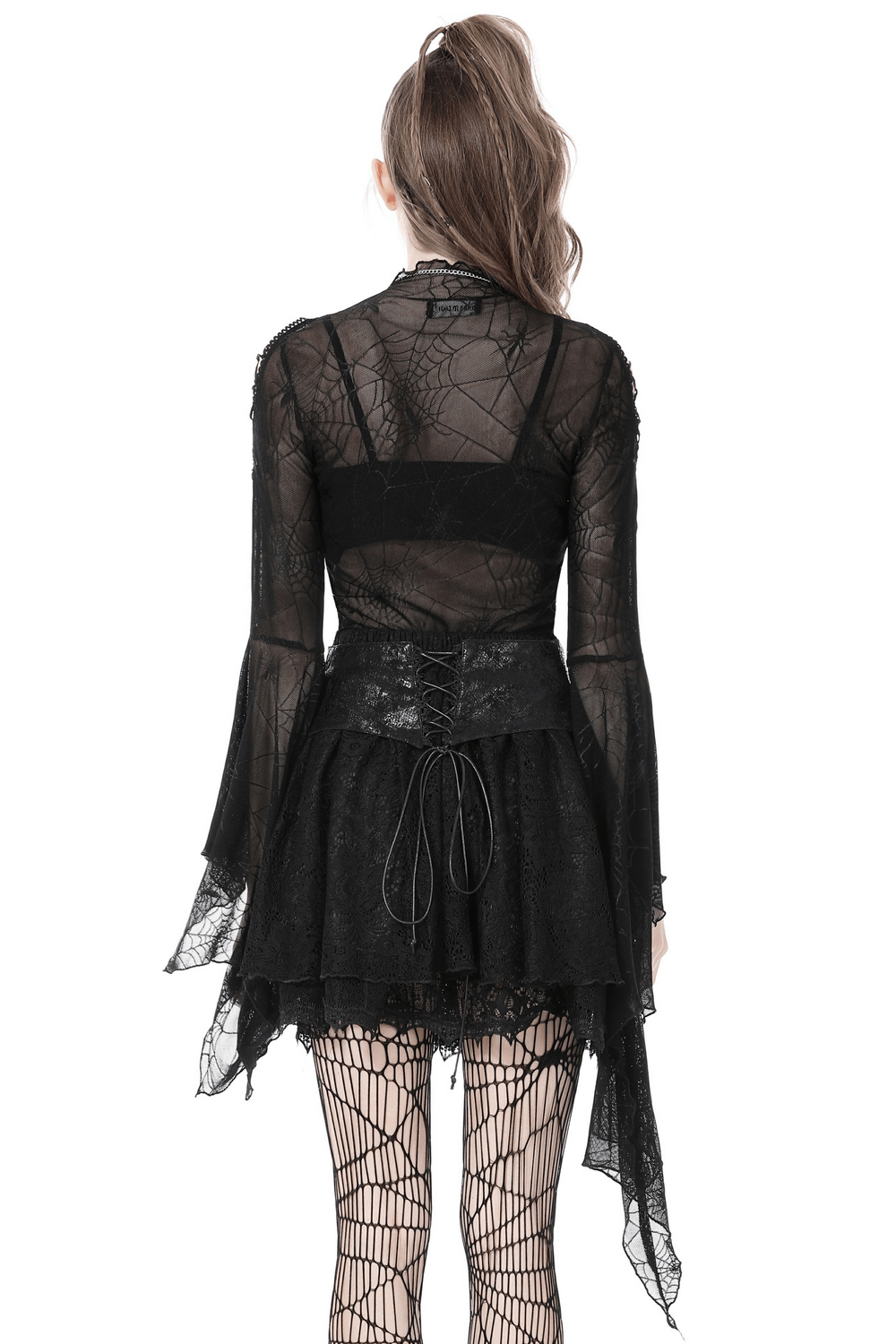 Back view of Gothic Women's Mesh Spiderweb Top with Long Sleeves, showcasing intricate spiderweb design and layered skirt.