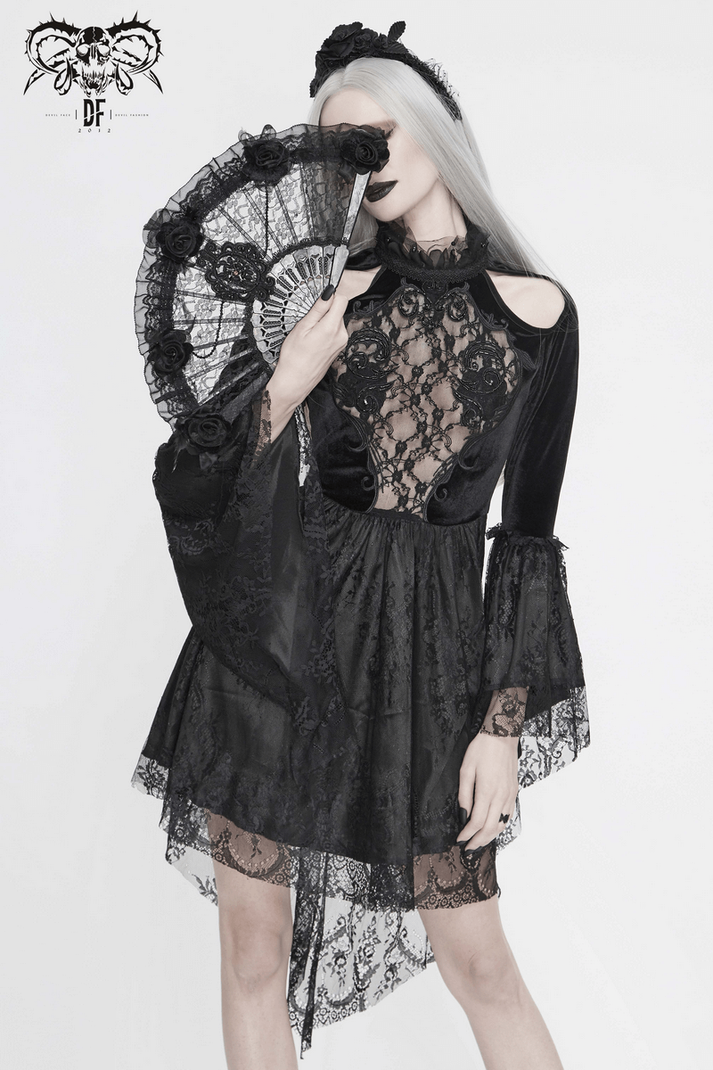 Elegant model in a Gothic off-shoulder velvet dress with lace and trumpet sleeves, holding a decorative fan.