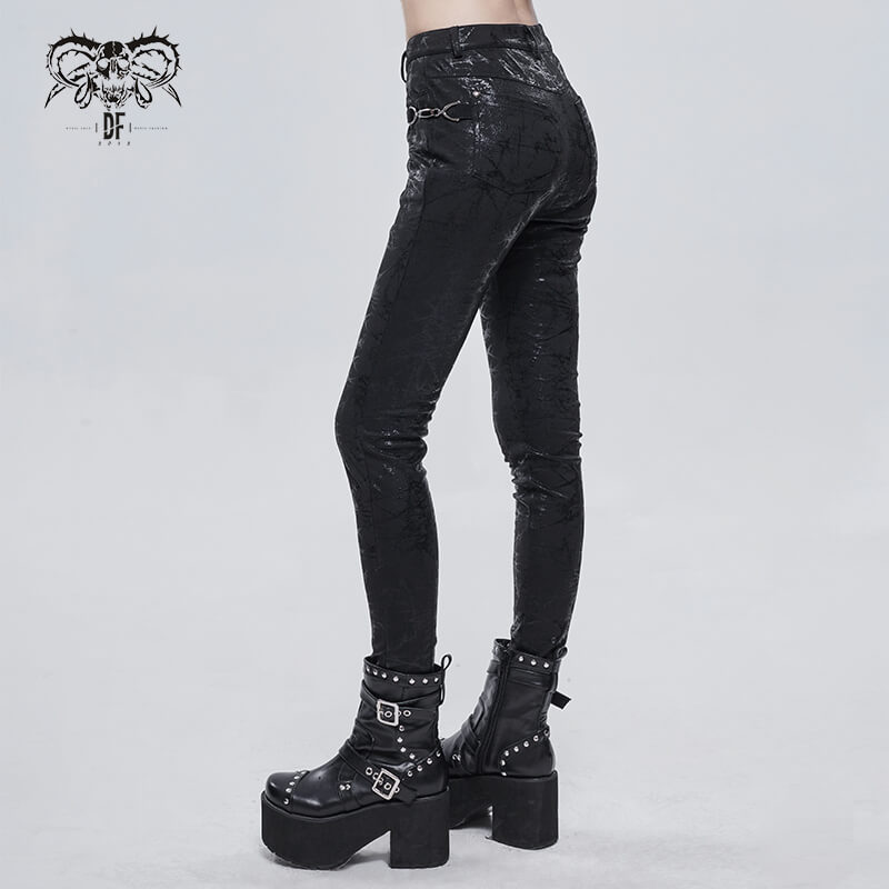 Gothic women's slim-fitted black pants with buckle accents, showcasing a stylish and edgy design.
