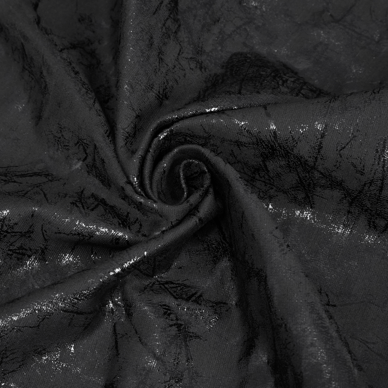 Close-up of glossy black fabric with a textured finish, perfect for gothic style women's slim-fitted pants.