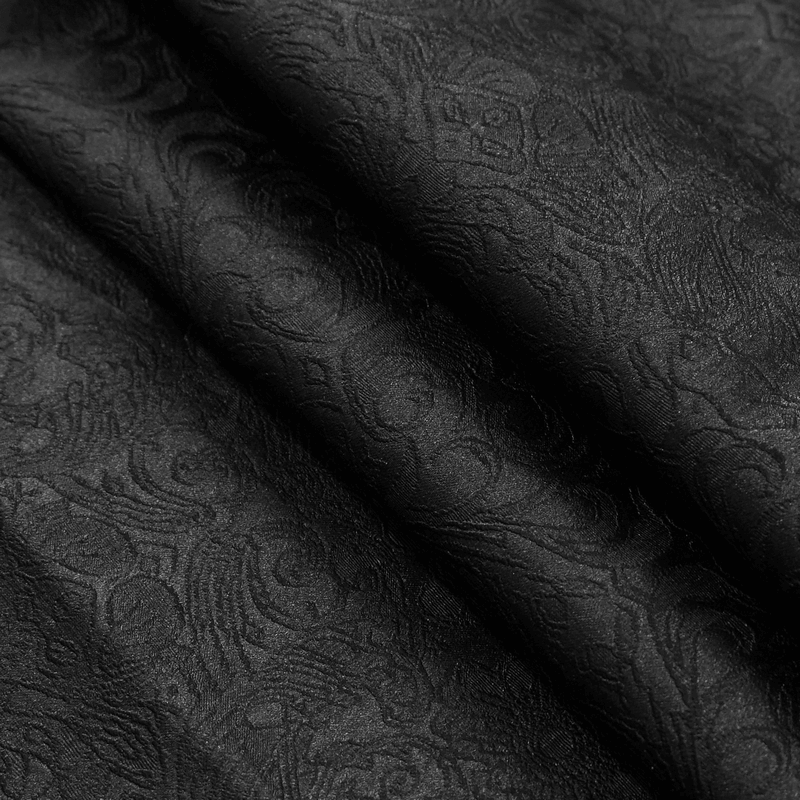 Close-up of textured black PU leather fabric, showcasing intricate patterns perfect for gothic-style clothing.
