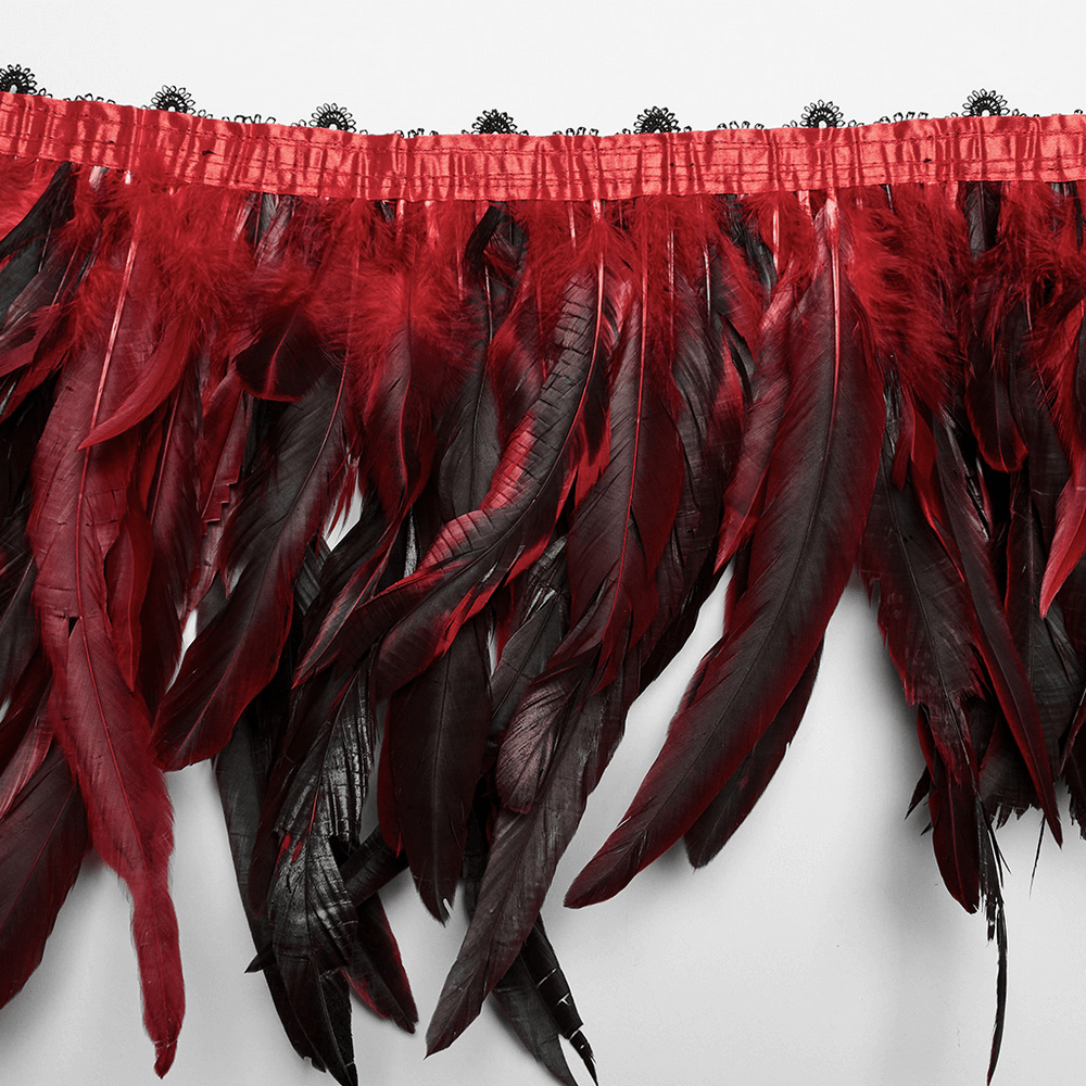 Dramatic black and red feather shoulder accessory for a gothic look and bold style.