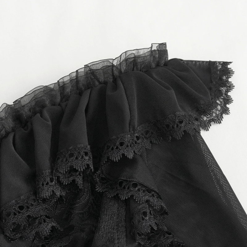 Close-up of black ruffled lace detail with transparent fabric, showcasing gothic elegance for women.