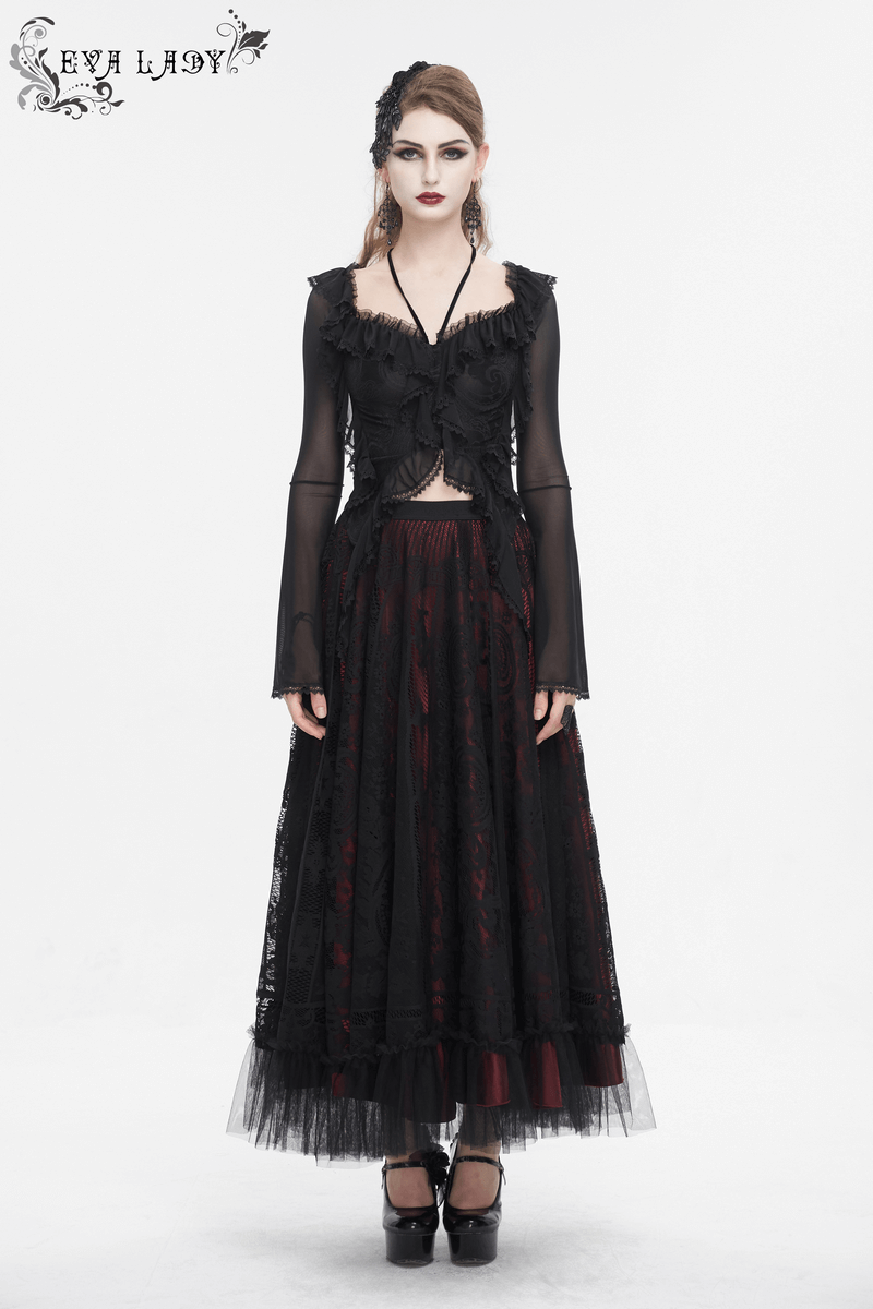 Gothic women's ruffled top with transparent sleeves, lace-up back, and long black skirt.