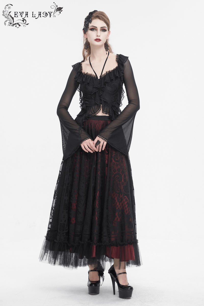 Gothic women's ruffled top with transparent sleeves and lace-up back, paired with a flowing black skirt and heels.
