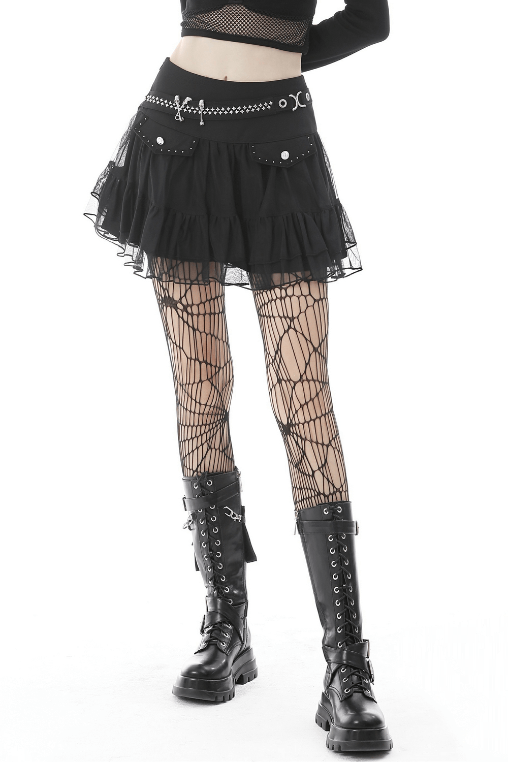 Gothic women's short pleated mesh skirt with chains, paired with fishnet tights and combat boots for a punk look.