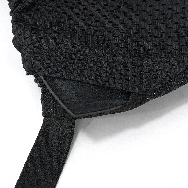 Close-up of a gothic women's black bikini top showing mesh fabric and stylish design details.