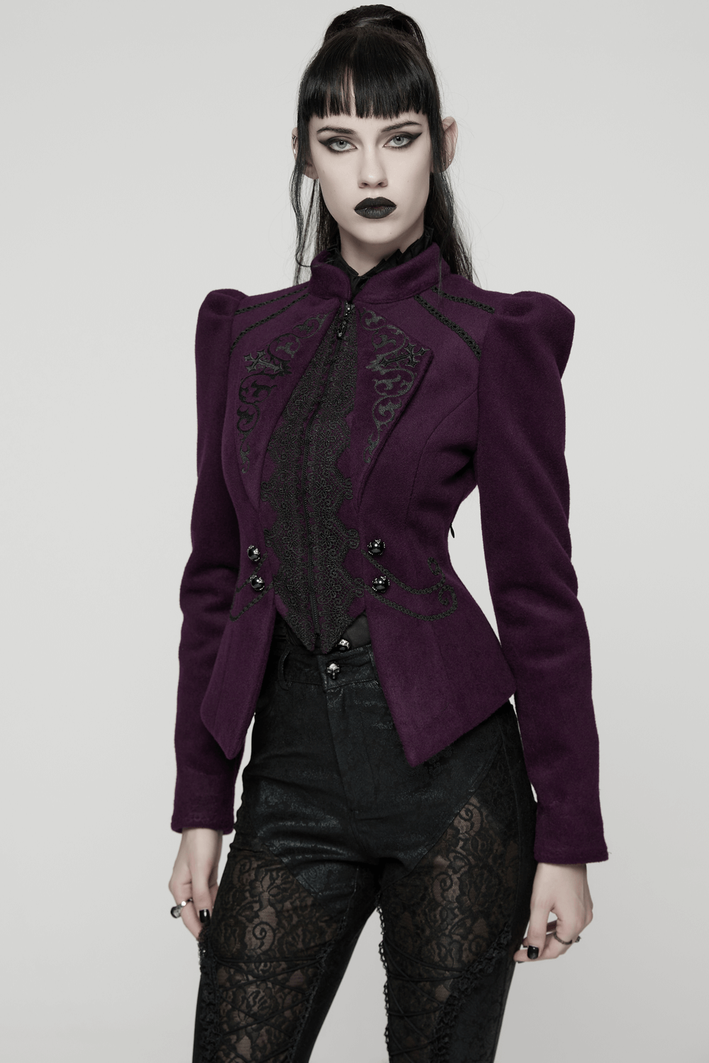 Gothic Woolen Jacket with Embroidery and Lace Back worn by a model, featuring elegant details and a tailored fit.