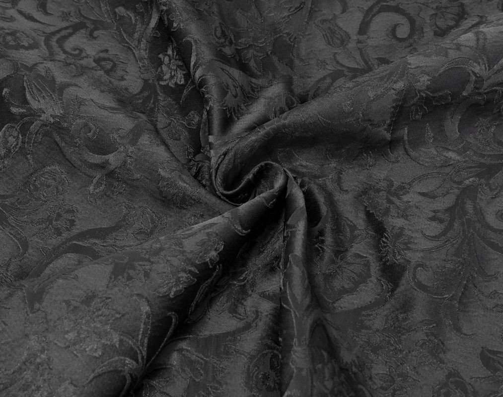 Textured black jacquard fabric with intricate floral patterns, perfect for gothic-style vests.