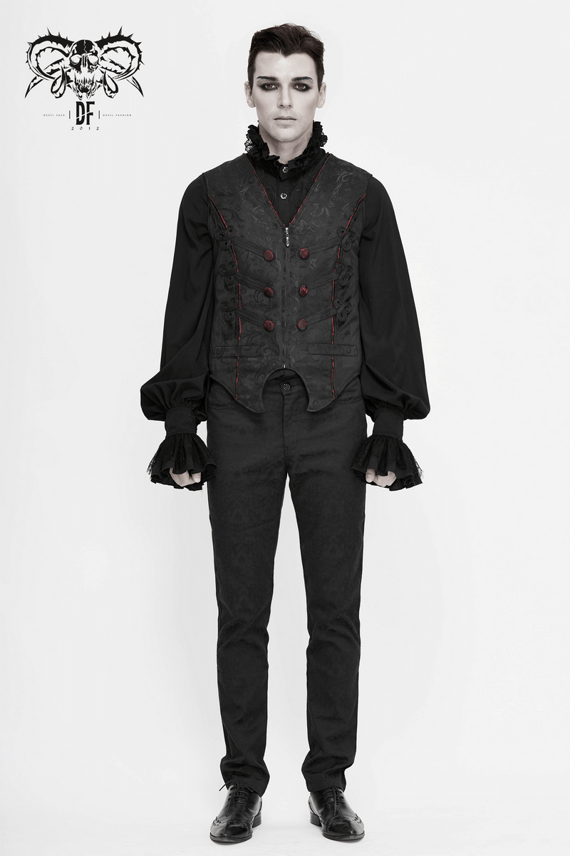 Man in gothic-style black vest with red buttons and ruffled sleeves, showcasing alternative fashion.