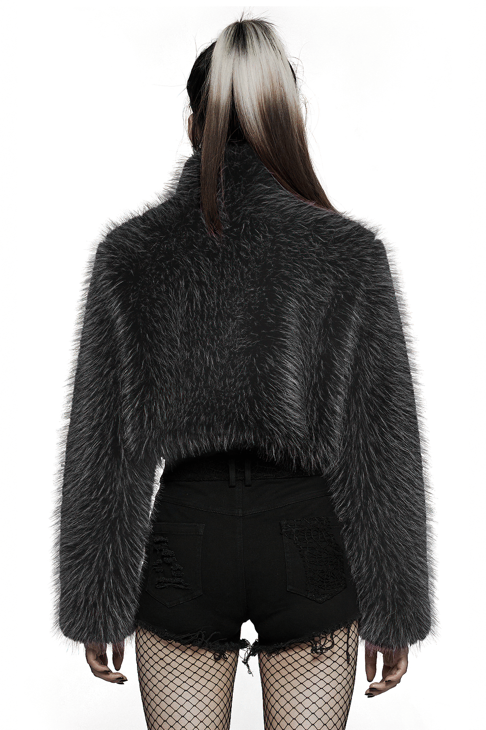 Back view of a woman wearing a gray faux fur crop jacket with a bold and edgy design.