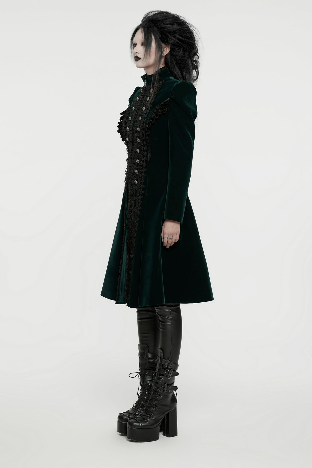 Elegant green velvet Gothic coat with lace and ruffle details, featuring a dramatic A-line silhouette.