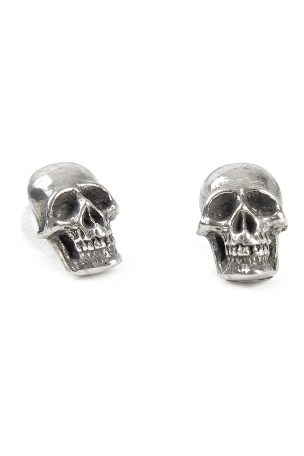 Grim skull ear studs in silver with surgical steel posts, ideal for gothic and punk fashion enthusiasts.