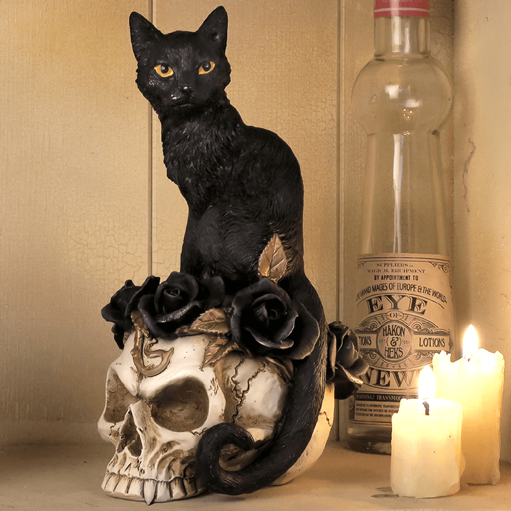 Grimalkin's Ghost Cat Skull Ornament with black roses, symbolizing ancient wisdom and mystique for gothic decor.