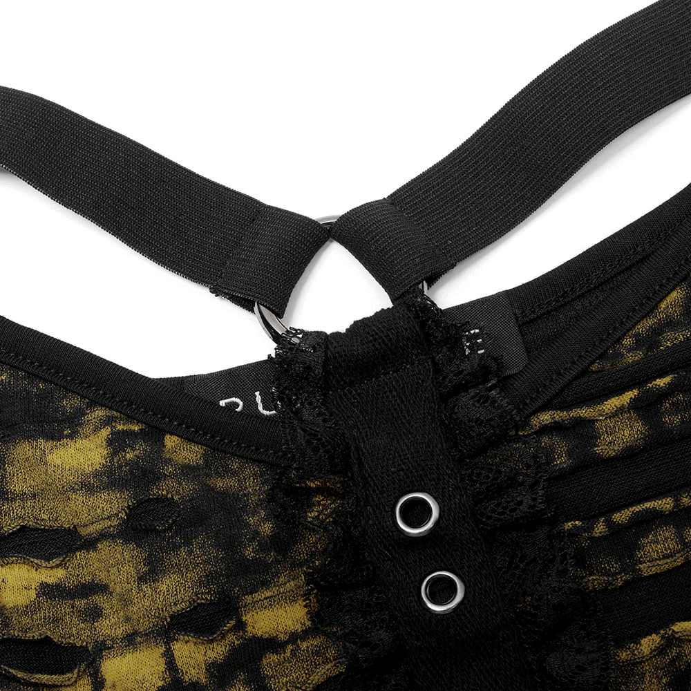 Close-up of grunge contrast strap detail on a Gothic knitted crop T-shirt with unique texturing.