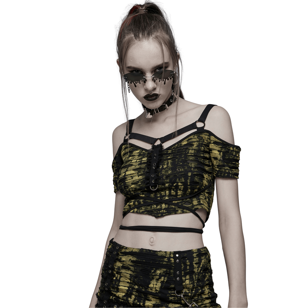 Gothic knit crop T-shirt with straps, bold yellow and black print, perfect for edgy fashion lovers.