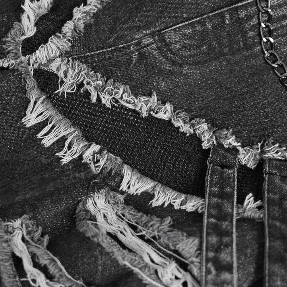 Jean grunge déchiré à jambes larges avec détails de chaînes