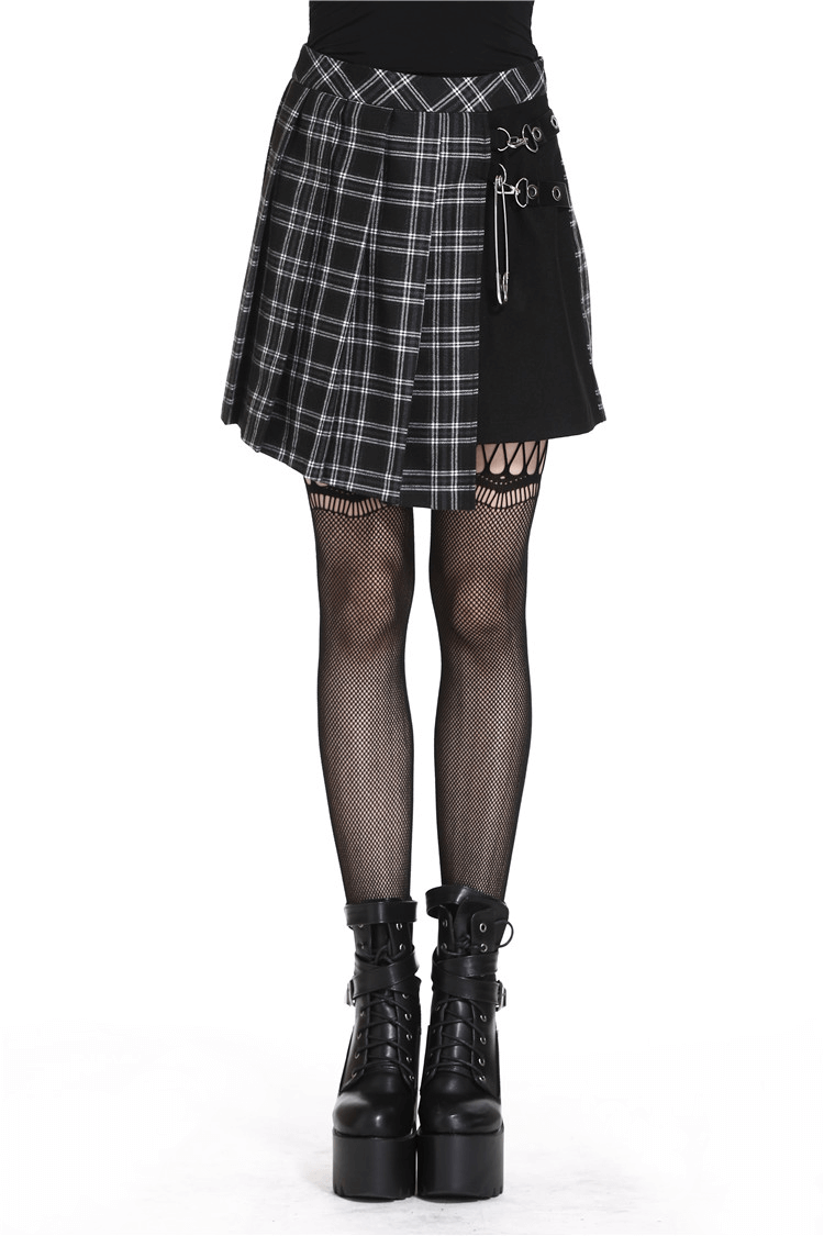 Grunge gothic asymmetrical plaid mini skirt with large pin accents and fishnet tights.