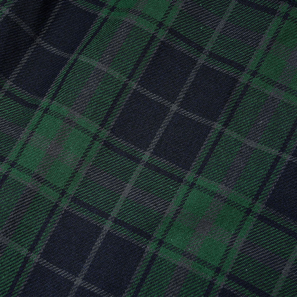 Close-up of the grunge plaid fabric featuring green and navy tones, perfect for a high-waist mini skirt.