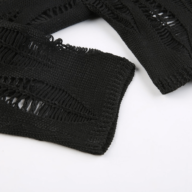 Close-up of black vintage grunge pullover featuring ripped details and hollow-out design, perfect for edgy, stylish looks.