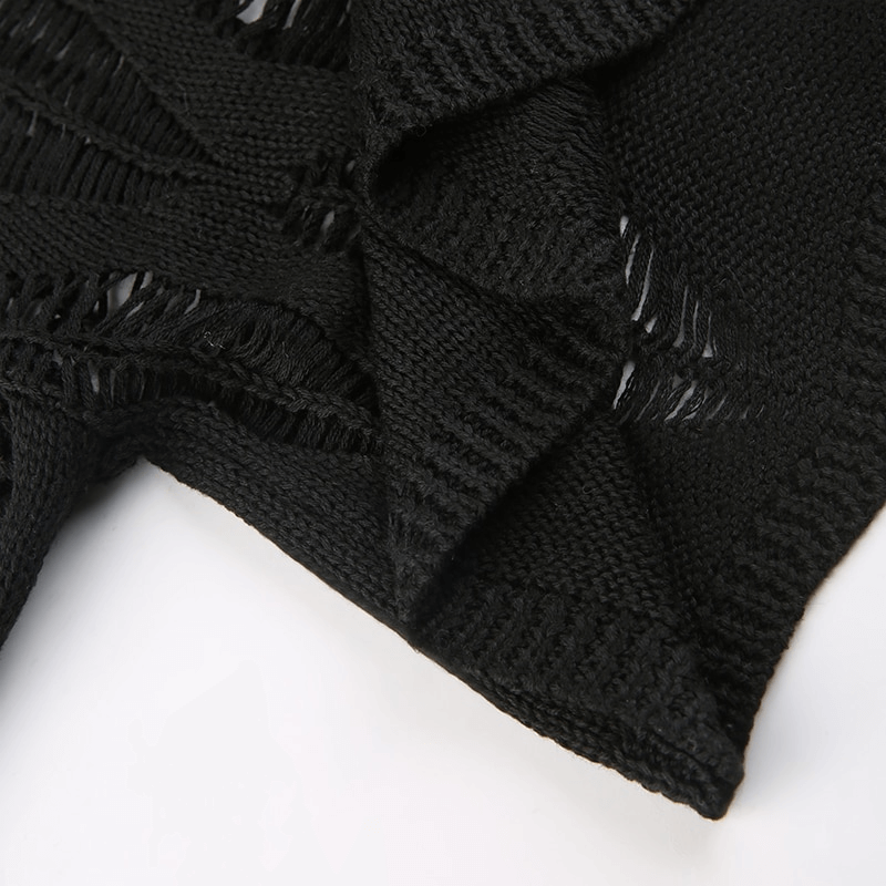 Black cropped pullover showcasing grunge style with hollow-out details and edgy textures.