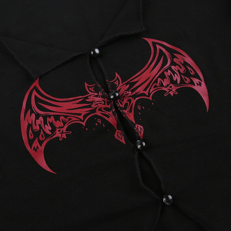 Gothic-inspired women's long-sleeve top featuring a striking red bat graphic and button closure.
