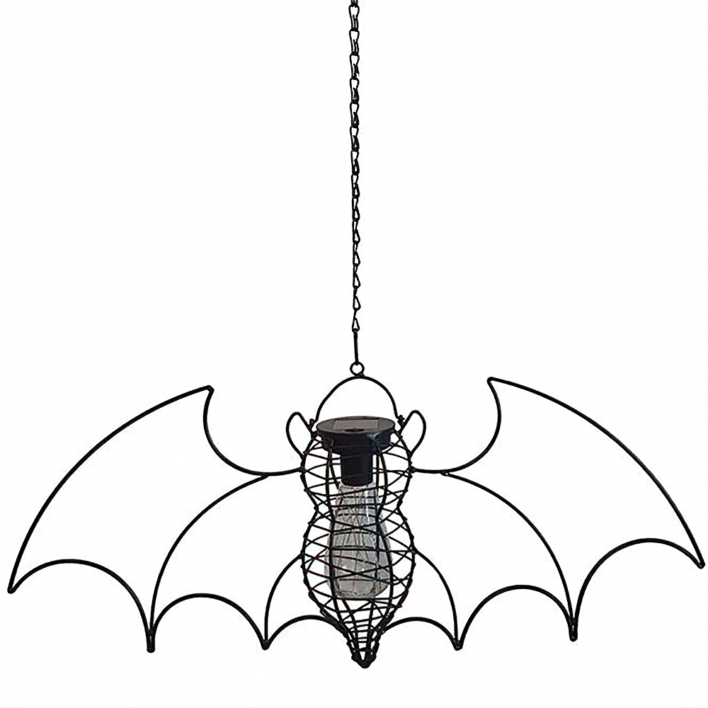 Hanging bat solar lantern with LED bulb, perfect for gothic gardens, charging in sunlight and glowing at dusk.