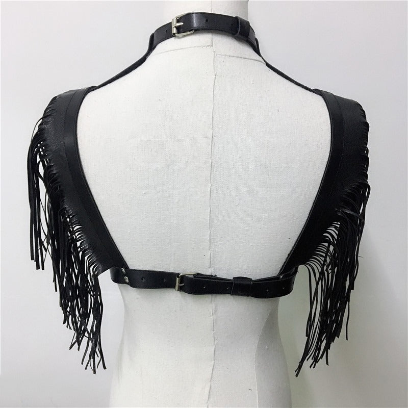 Black leather crop top with fringe straps, ideal for gothic or rave outfits, featuring stainless steel hardware and adjustable belts.