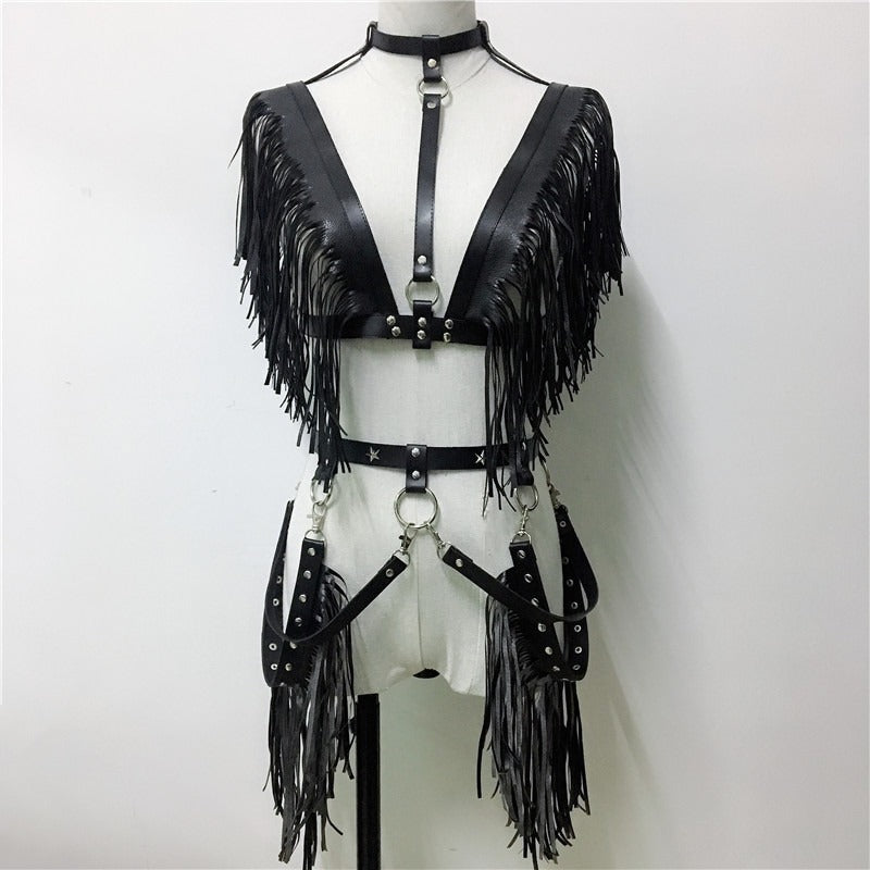Stylish black leather crop top with fringe and chains, perfect for raves or gothic outfits.