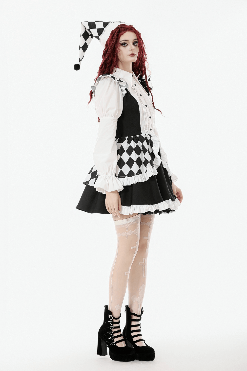 Harlequin Black and White Gothic Ruffle Mini Dress worn by a model in a playful pose, showcasing its unique style.