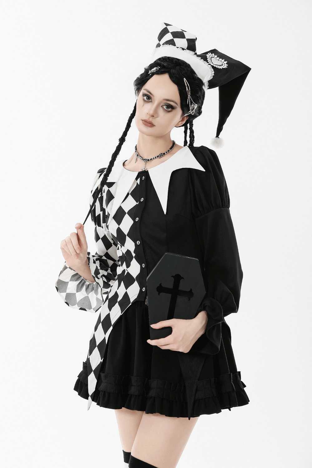 Lolita model wearing a Harlequin Diamond Pattern Shirt with Front Button Detail, showcasing puff sleeves and a gothic aesthetic.