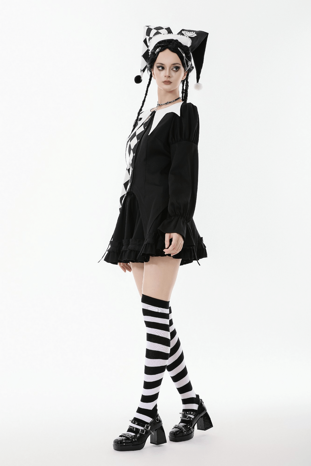 Harlequin Diamond Pattern Shirt with Front Button Detail worn with black and white striped stockings, showcasing playful gothic fashion.
