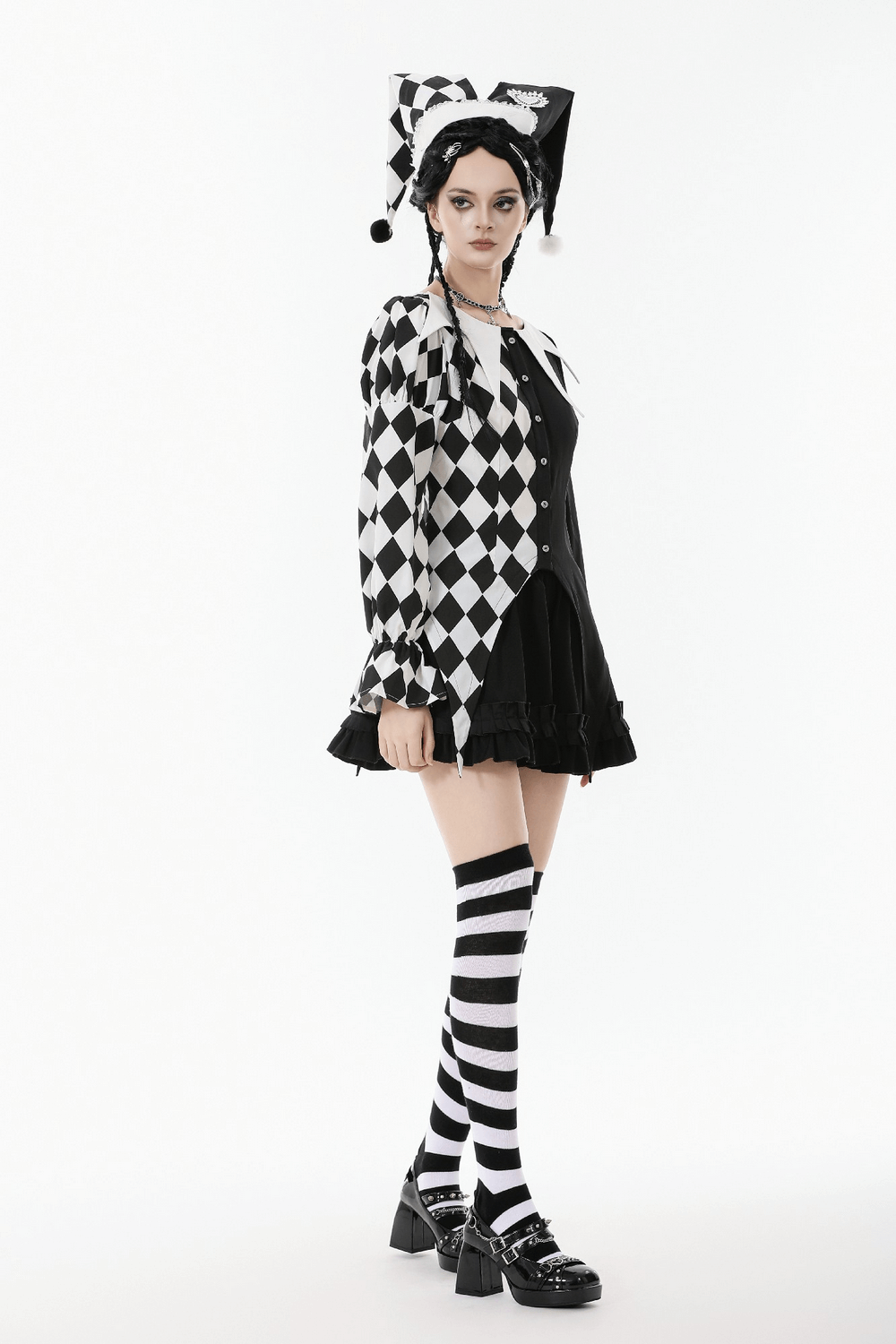 Harlequin Diamond Pattern Shirt with Front Button Detail modeled with striped socks and whimsical hat.