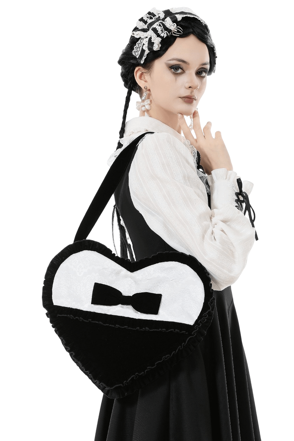 Heart-Shaped Gothic Lace Bow Crossbody Bag worn by model showcasing gothic elegance and intricate lace details.