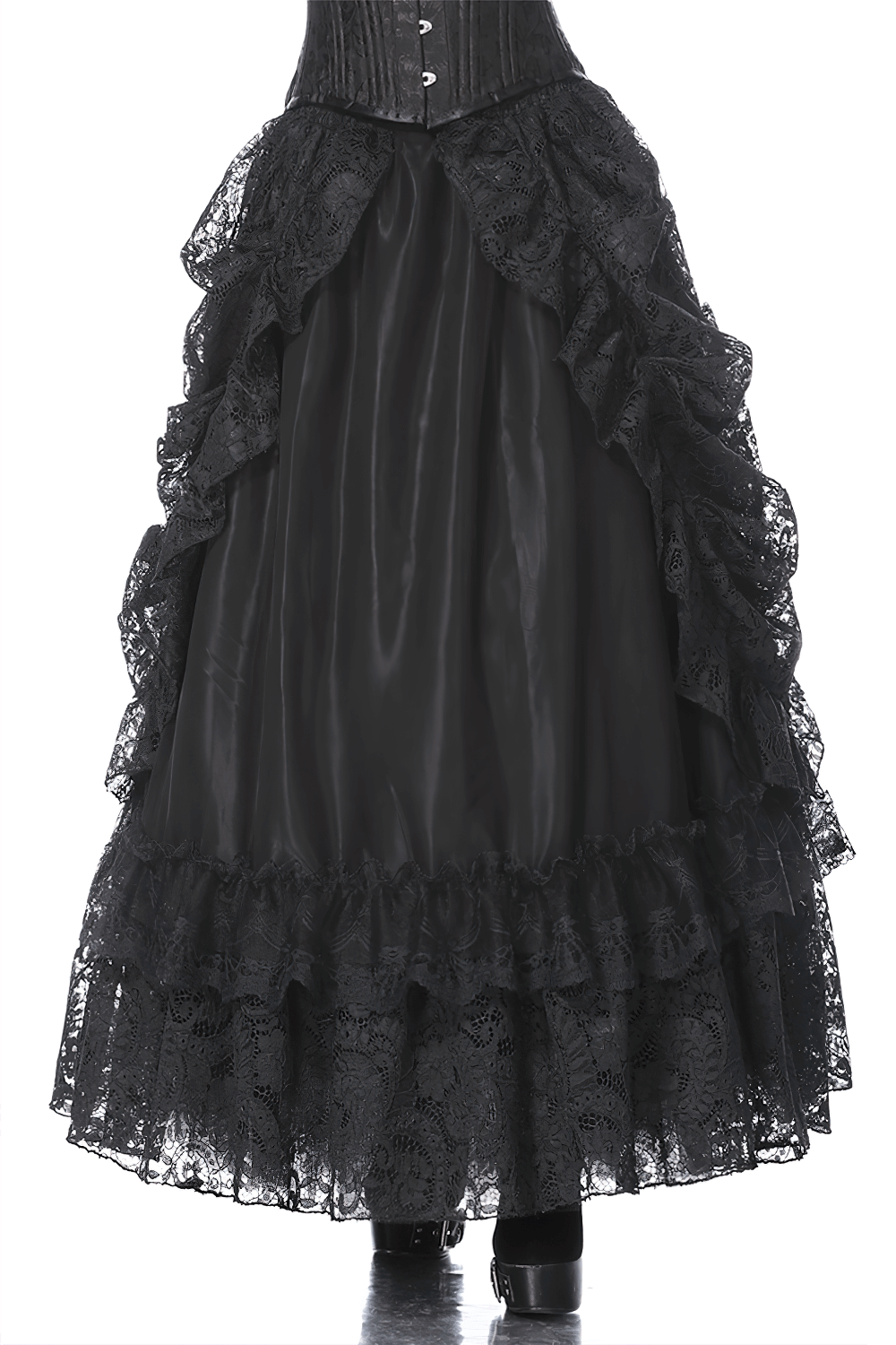 High front low back black lace maxi skirt with ruffled hem, exuding Victorian elegance and drama.