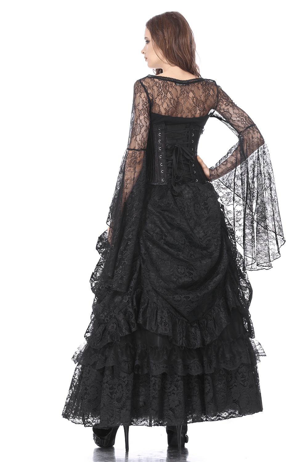 Elegant model showcasing the back of a black lace maxi skirt with dramatic sleeves, perfect for a gothic look.