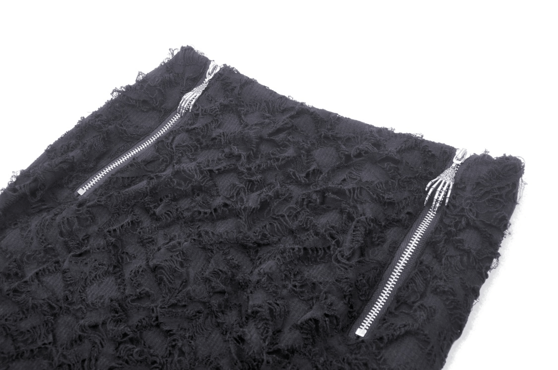 Close-up of black high-low lace skirt with edgy side zippers, perfect for gothic punk style.