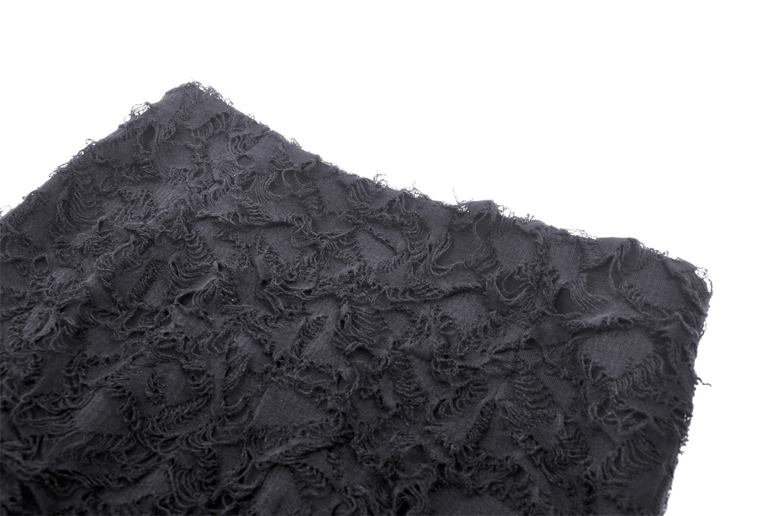 Black textured fabric showcasing intricate lace patterns for high-low gothic skirt.