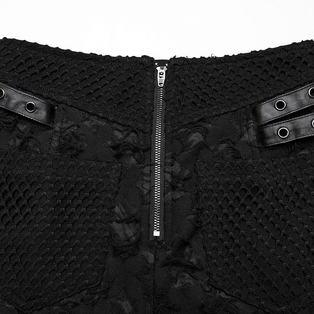 Close-up of the back of a punk detachable skirt with faux leather accents and zipper detail.