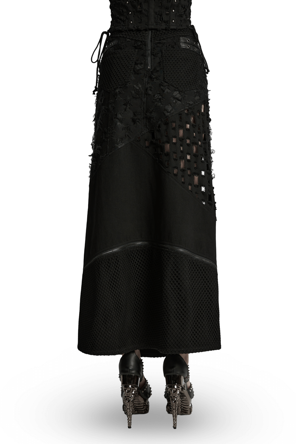 Back view of a high slit punk detachable skirt with faux leather accents, showcasing edgy design and intricate textures.