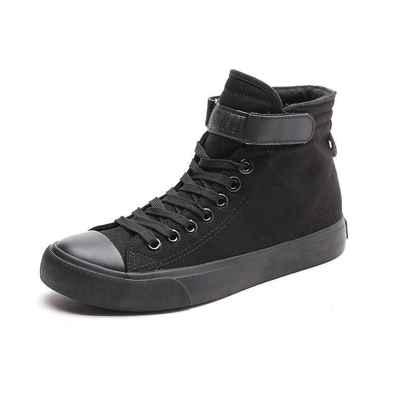 Black high top sneakers for women with lace-up design and rubber sole, perfect for rock outfits.