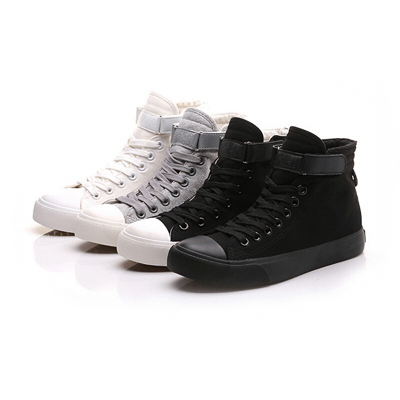 High top sneakers for women in black, white, and grey, featuring lace-up design and flat soles, perfect for rock outfits.